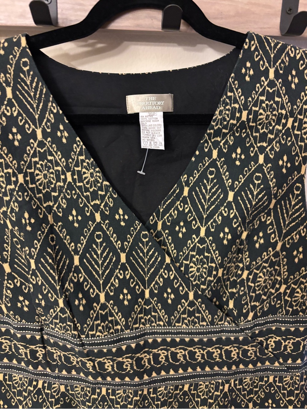 The Territory Ahead Black and Gold Geometric Wrap Dress